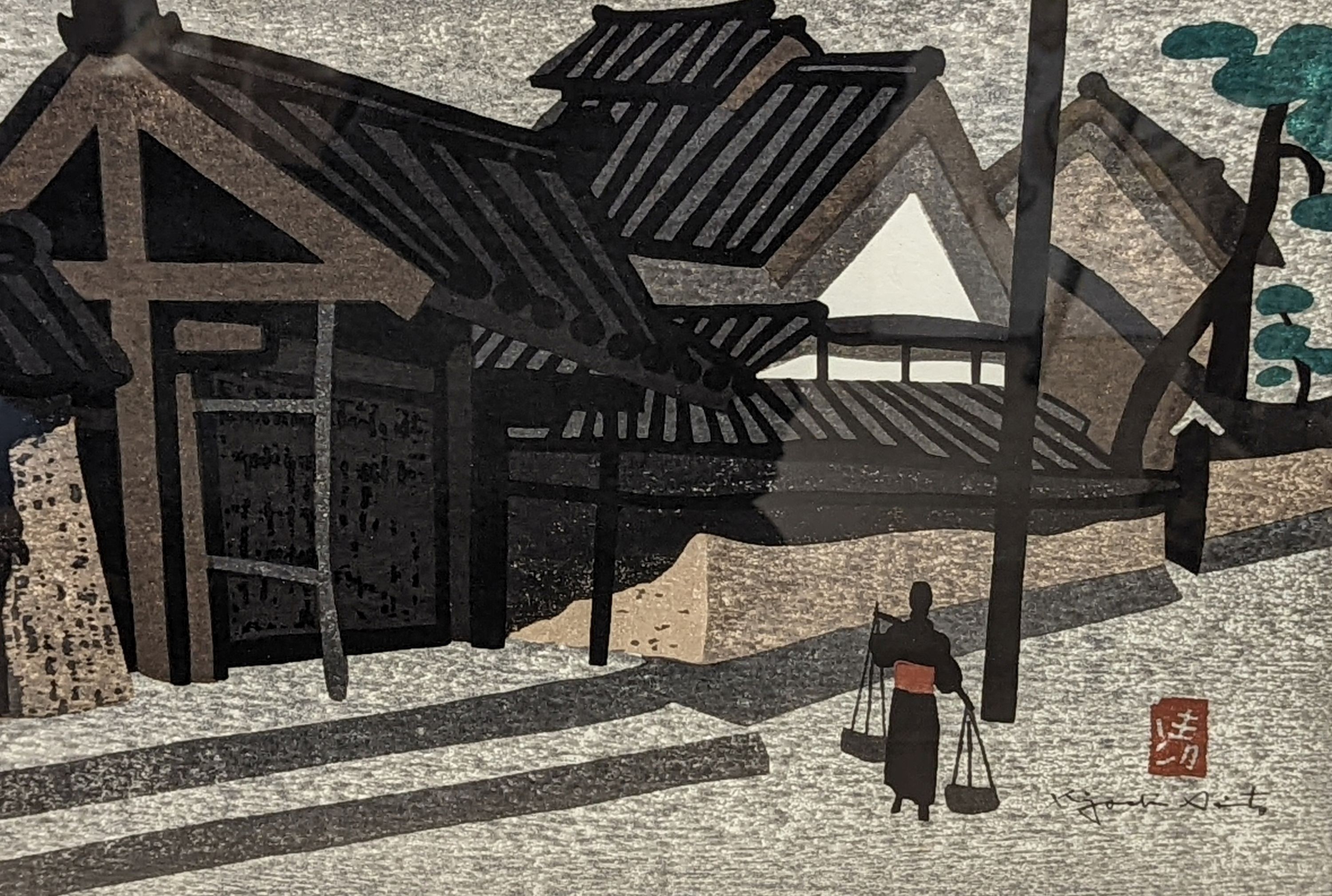 Kiyoshi Saito (1907-1997), woodblock print, Figure passing houses, 27 x 39cm